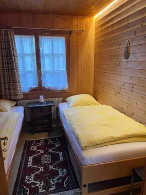 Ein Bett oder Betten in einem Zimmer der Unterkunft Chalet Kuckuk including Studio