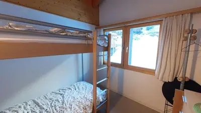 Ein Bett oder Betten in einem Zimmer der Unterkunft Doberts 6, un duplex au pied des montagnes!