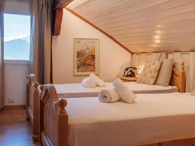 Ein Bett oder Betten in einem Zimmer der Unterkunft Apartment Les Agettes 1865 by Interhome