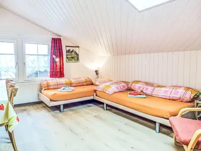 Ein Bett oder Betten in einem Zimmer der Unterkunft Apartment Beim Thor Gross by Interhome