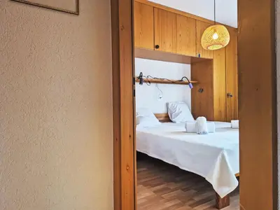 Ein Bett oder Betten in einem Zimmer der Unterkunft Apartment La Meinaz by Interhome