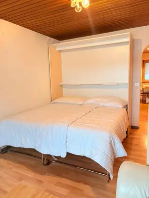 Ein Bett oder Betten in einem Zimmer der Unterkunft Studio Ambiente Appartement B6