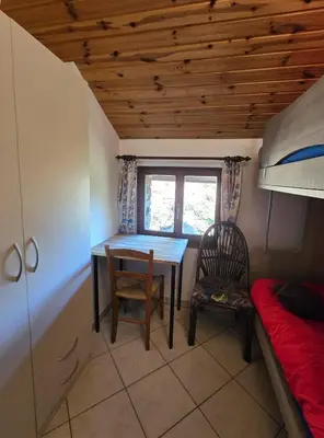 Ein Sitzbereich in der Unterkunft Rustico Kevin by HolAp SA