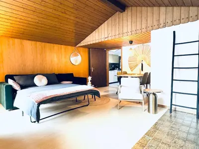 Ein Bett oder Betten in einem Zimmer der Unterkunft Bergtraum Suite