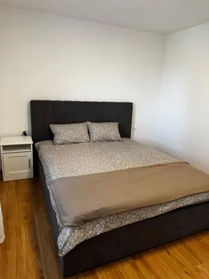 Ein Bett oder Betten in einem Zimmer der Unterkunft Appartement Niesenblick 2