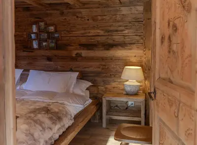 Ein Bett oder Betten in einem Zimmer der Unterkunft Chalet with fireplace and sauna
