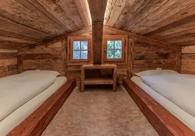 Ein Bett oder Betten in einem Zimmer der Unterkunft Chalet with fireplace and sauna