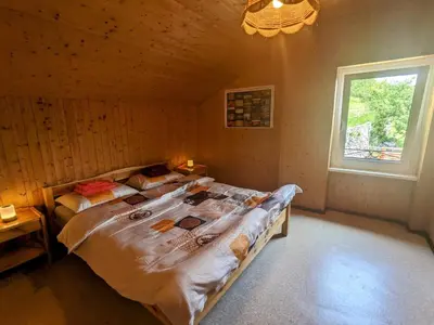Ein Bett oder Betten in einem Zimmer der Unterkunft Wild Valley Casa Pergola in Valle Onsernone