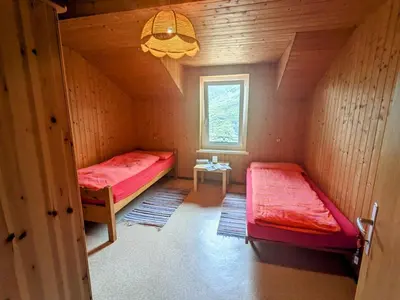 Ein Bett oder Betten in einem Zimmer der Unterkunft Wild Valley Casa Pergola in Valle Onsernone