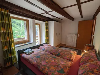 Ein Bett oder Betten in einem Zimmer der Unterkunft Wild Valley Mountain Getaway in Valle Onsernone