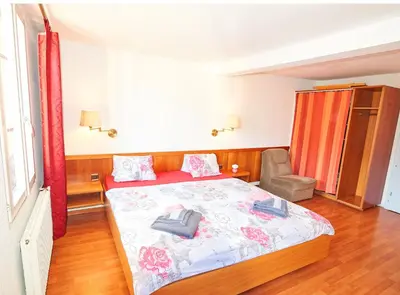 Ein Bett oder Betten in einem Zimmer der Unterkunft Residence Jungfrau
