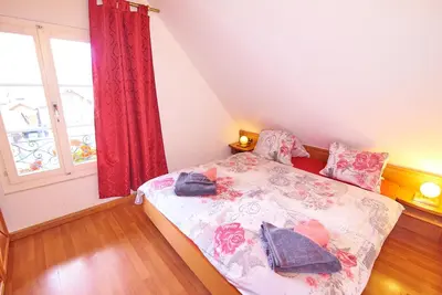 Ein Bett oder Betten in einem Zimmer der Unterkunft Residence Jungfrau