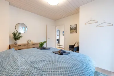 Ein Bett oder Betten in einem Zimmer der Unterkunft Modern Alpine Stay with free parking