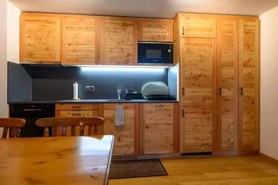 Küche/Küchenzeile in der Unterkunft Residence Veisivis 72, appartement de charme rénové à La Forclaz, Evolène
