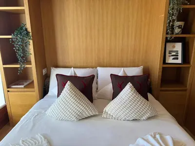 Ein Bett oder Betten in einem Zimmer der Unterkunft Lac & Love - Alpine Escape