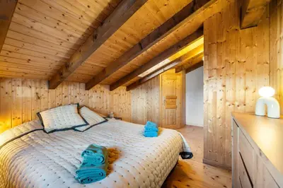 Ein Bett oder Betten in einem Zimmer der Unterkunft Le Petiot - mini chalet - maxi douceur - 4personnes