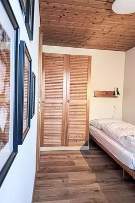 Ein Bett oder Betten in einem Zimmer der Unterkunft Apartment Rottal 4 Bett Wohnung by Interhome