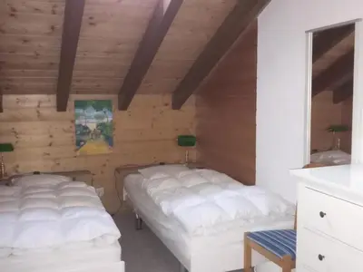 Ein Bett oder Betten in einem Zimmer der Unterkunft Apartment La Collina-Haus C- by Interhome