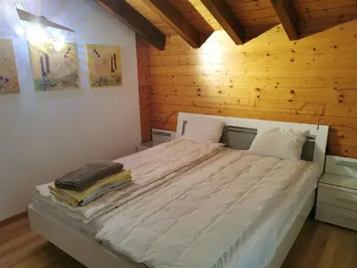 Ein Bett oder Betten in einem Zimmer der Unterkunft Apartment La Collina-Haus C- by Interhome