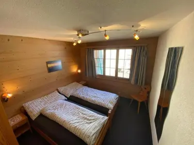 Ein Bett oder Betten in einem Zimmer der Unterkunft Apartment Chalet Barbara by Interhome