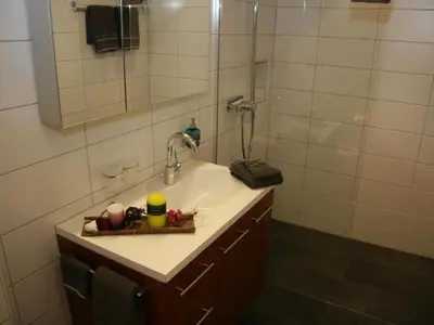 Ein Badezimmer in der Unterkunft Apartment Chalet Bärgbächli by Interhome