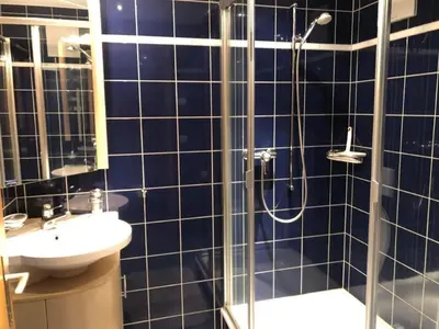 Ein Badezimmer in der Unterkunft Apartment Pollux 4-Bett-Appartement by Interhome