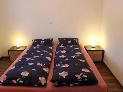 Ein Bett oder Betten in einem Zimmer der Unterkunft Apartment Adlerhorst by Interhome
