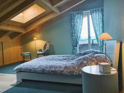 Ein Bett oder Betten in einem Zimmer der Unterkunft Apartment Mountain 4U by Interhome