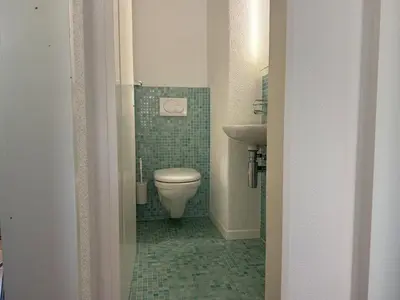 Ein Badezimmer in der Unterkunft Apartment modern eingerichtete Ferienwohnung in Andermatt by Interhome