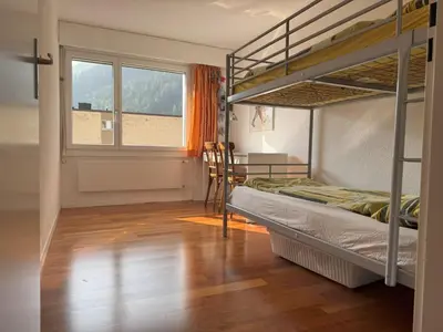 Ein Bett oder Betten in einem Zimmer der Unterkunft Apartment modern eingerichtete Ferienwohnung in Andermatt by Interhome