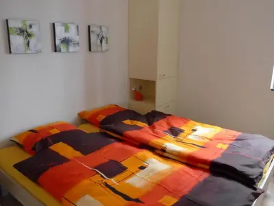 Ein Bett oder Betten in einem Zimmer der Unterkunft Apartment Casa Ninfea by Interhome