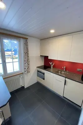 Küche/Küchenzeile in der Unterkunft Apartment Chalet Mislin- Grindelwald direkte Bergsicht by Interhome