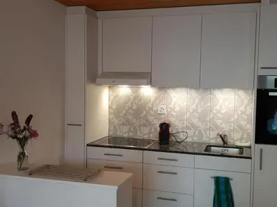 Küche/Küchenzeile in der Unterkunft Apartment Rothorn-Center A - 1-OG- Schöpfer by Interhome