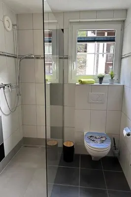 Ein Badezimmer in der Unterkunft Apartment Haus Mondelli by Interhome