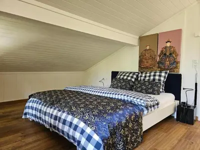 Ein Bett oder Betten in einem Zimmer der Unterkunft Holiday Home Chalet Tannegüetli by Interhome
