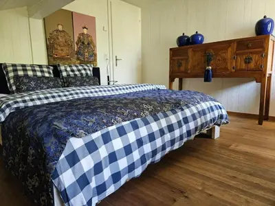 Ein Bett oder Betten in einem Zimmer der Unterkunft Holiday Home Chalet Tannegüetli by Interhome