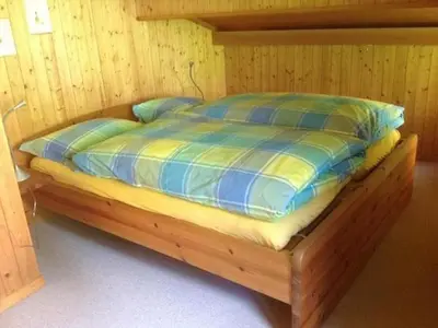Ein Bett oder Betten in einem Zimmer der Unterkunft Holiday Home Datscha by Interhome