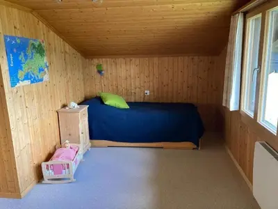 Ein Bett oder Betten in einem Zimmer der Unterkunft Holiday Home Datscha by Interhome