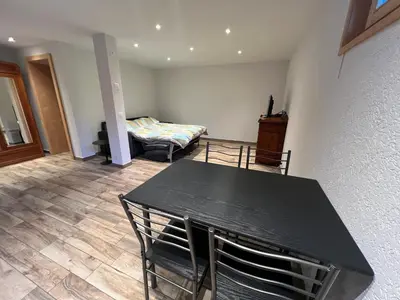 Ein Bett oder Betten in einem Zimmer der Unterkunft Studio Chez Régio à La Tour, Evolène