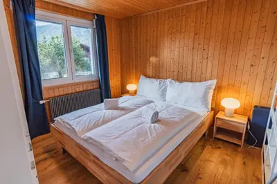 Ein Bett oder Betten in einem Zimmer der Unterkunft Chalet Flora Mountain view with Private Garden