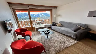 Ein Sitzbereich in der Unterkunft Superbe appartement avec 2 chambres avec vue imprenable sur les Alpes