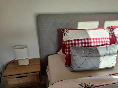 Ein Bett oder Betten in einem Zimmer der Unterkunft Frutigen 20 nach Interlaken