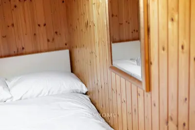 Ein Bett oder Betten in einem Zimmer der Unterkunft Le Bocage - Vue montagne - By CosyHome