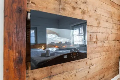 Ein Bett oder Betten in einem Zimmer der Unterkunft Historic Charming House 10 min from Crans-Montana