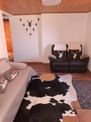 Ein Sitzbereich in der Unterkunft Charmant appartement Crans Montana