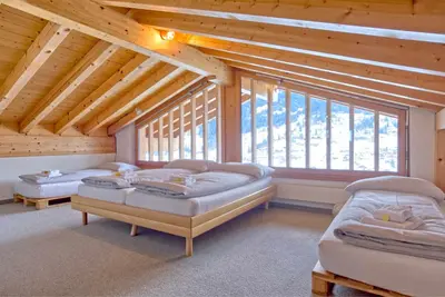 Ein Bett oder Betten in einem Zimmer der Unterkunft Apartment Eiger Sun - GRIWA RENT AG