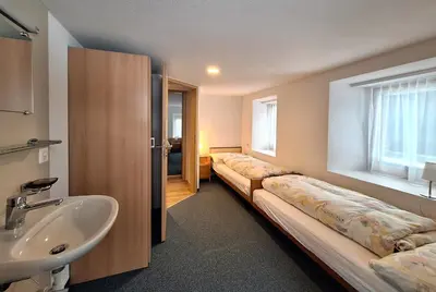 Ein Bett oder Betten in einem Zimmer der Unterkunft Sonnenhügel
