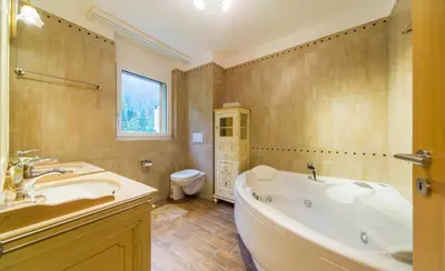 Ein Badezimmer in der Unterkunft Residenz Ambassador B13 mit Wellness-Fitness