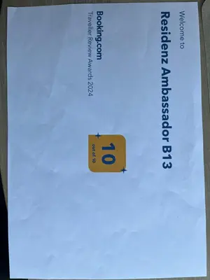 Ein Zertifikat, Auszeichnung, Logo oder anderes Dokument, das in der Unterkunft Residenz Ambassador B13 mit Wellness-Fitness ausgestellt ist