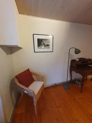Ein Sitzbereich in der Unterkunft Jolie maison de vacances au village